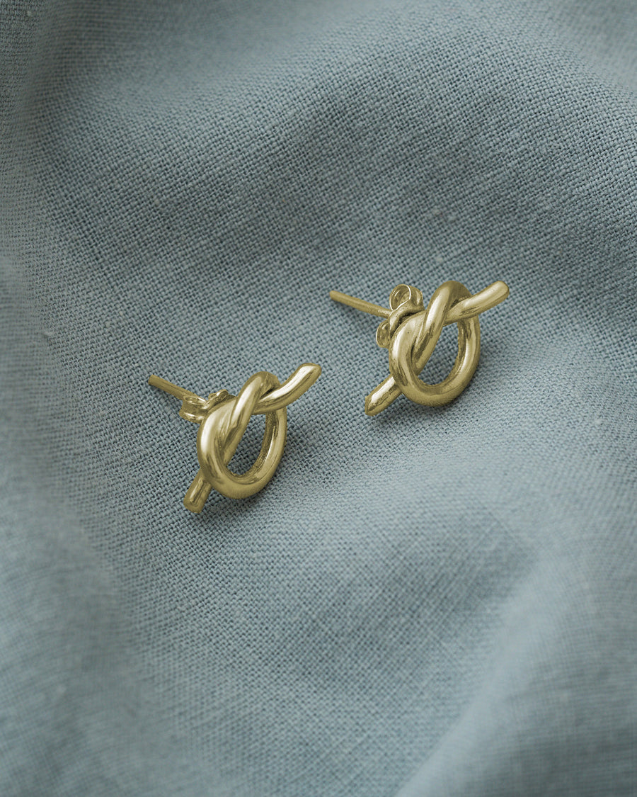 ARETES DESATA MIS NUDOS PLATA .925 Y ORO