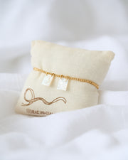 PULSERA ESCAPULARIO MADRE PERLA DESATANUDOS + SAGRADO CORAZÓN