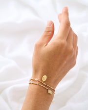 PULSERA DOBLE MEDALLA DESATADORA DE NUDOS + CRUZ