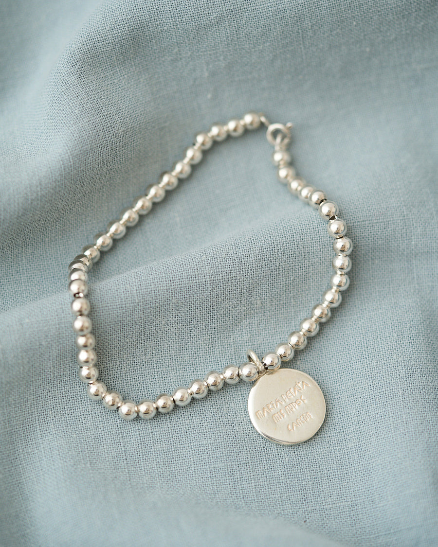 PULSERA ESFERAS CON MEDALLA DESATADORA PLATA .925