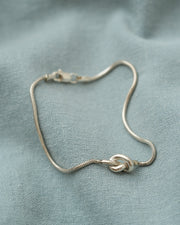 PULSERA NUDO EN CADENA PLATA .925